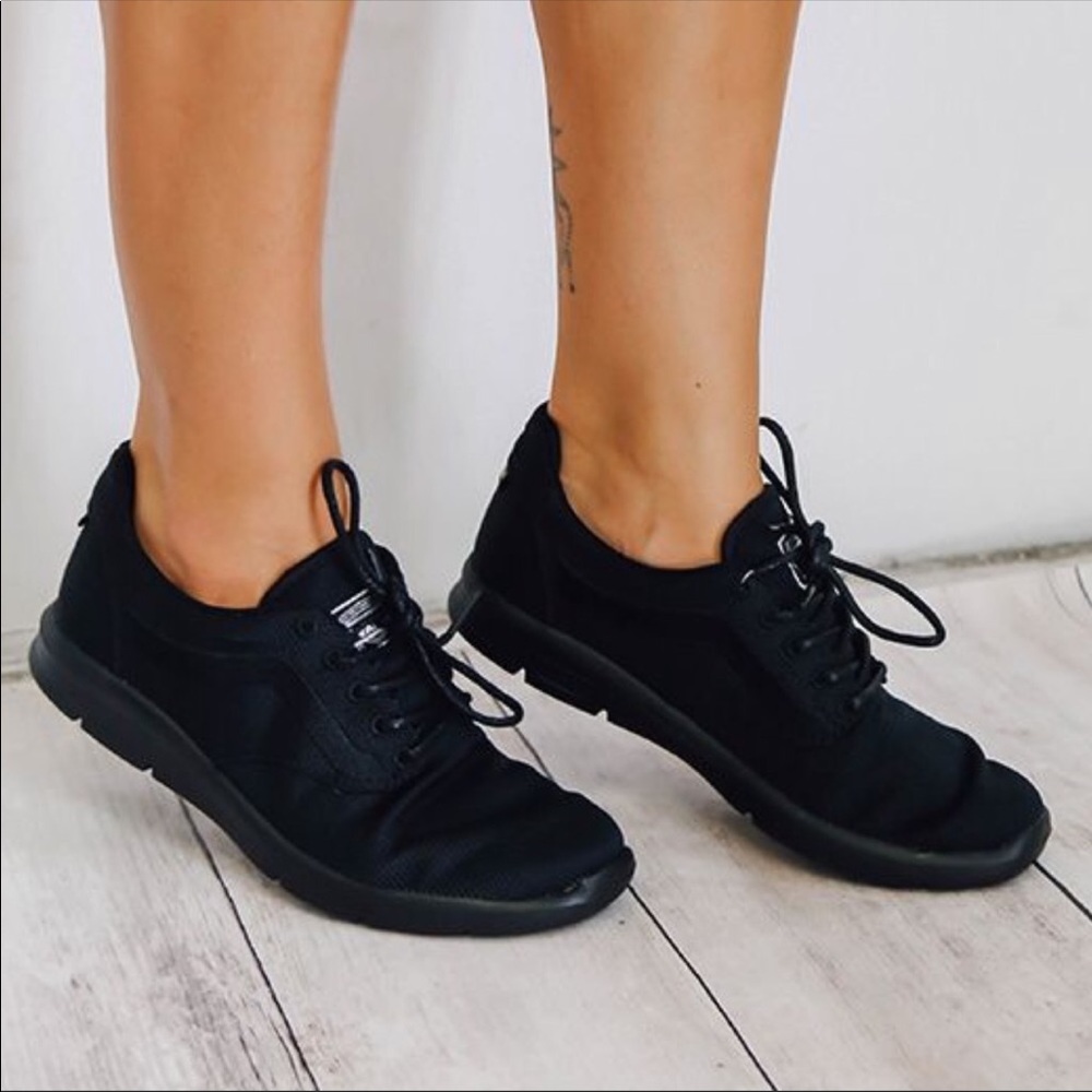 New never worn blacked out van sneakers